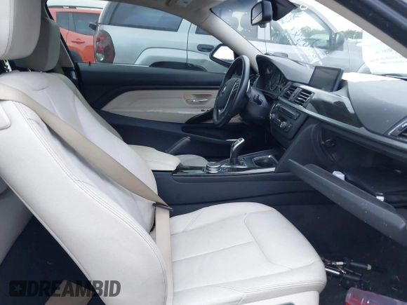 2015 BMW 4 Series 428i with VIN WBA3N3C54FK233803, listed as a IAAI auction lot 40481486 with 74,556 mi miles and . Bid and sale history available at DreamBid. Image 5.