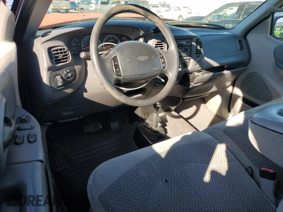 1999 Ford F-150 с VIN 1FTRF18WXXKB91056, выставлен на аукционе Copart как лот 79972304 с пробегом 108 490 миль миль и Списание • Salvage title. История ставок и продаж доступна на DreamBid. Изображение 8.
