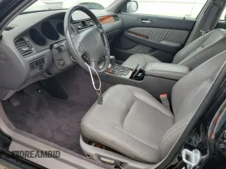 1998 Acura RL Premium with VIN JH4KA9656WC001298, listed as a Copart auction lot 73740154 with 108,066 mi miles and Salvage Title. Bid and sale history available at carsss.com. Image 7.