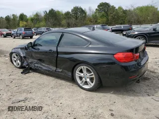 2015 BMW 4 Series 435i with VIN WBA3R1C58FK195520, listed as a Copart auction lot 52079125 with 101,584 mi miles and Salvage title. Bid and sale history available at DreamBid. Image 2.