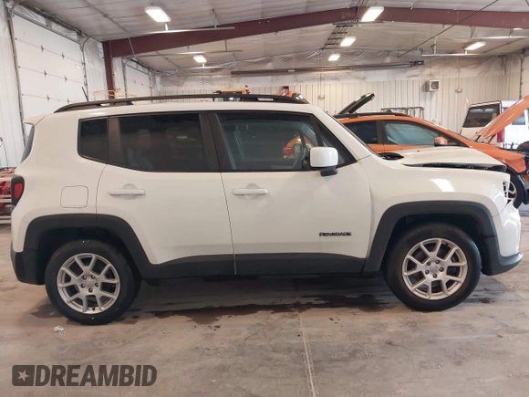 2019 Jeep Renegade Latitude with VIN ZACNJABB6KPK21894, listed as a IAAI auction lot 42079988 with 103,394 mi miles and . Bid and sale history available at DreamBid. Image 13.