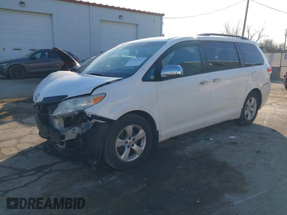 2014 Toyota Sienna LE AAS with VIN 5TDKK3DC2ES483679, listed as a IAAI auction lot 41547261 with 142,697 mi miles. Bid and sale history available at carsss.com. Image 18.
