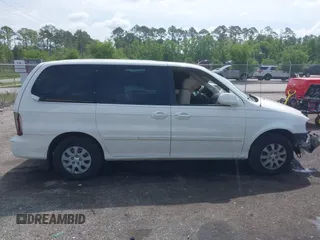 2005 Kia Sedona LX with VIN KNDUP132056702484, listed as a IAAI auction lot 42099572 with 195,528 mi miles and . Bid and sale history available at DreamBid. Image 13.