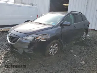 2014 Mazda CX-9 Sport with VIN JM3TB3BVXE0428593, listed as a Copart auction lot 53107195 with 102,957 mi miles and Salvage title. Bid and sale history available at DreamBid. Image 1.