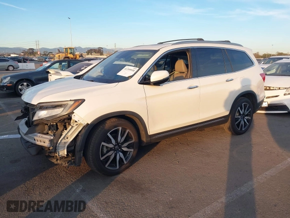 2019 Honda Pilot Touring 8-Passenger with VIN 5FNYF5H97KB005203, listed as a IAAI auction lot 41399930 with 47,267 mi miles and . Bid and sale history available at DreamBid. Image 17.