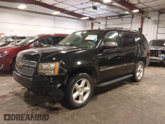 2012 Chevrolet Tahoe LTZ with VIN 1GNSKCE02CR297261, listed as a IAAI auction lot 40255137 with 283,110 mi miles and . Bid and sale history available at DreamBid. Image 22.