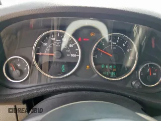 2013 Jeep Wrangler Unlimited Sport z VIN 1C4BJWDGXDL606491, wystawiony jako Copart lot #56065425 z przebiegiem 168 709 mil mil oraz Szkoda całkowita • Salvage title. Historia ofert i sprzedaży dostępna na DreamBid. Obrazek 9.