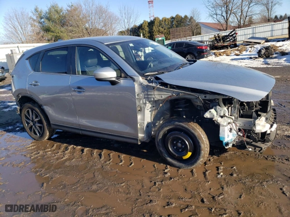 2018 Mazda CX-5 Touring with VIN JM3KFBCM9J0343240, listed as a Copart auction lot 88751245 with 132,038 mi miles and Salvage Title. Bid and sale history available at carsss.com. Image 4.