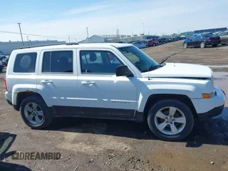 2014 Jeep Patriot Latitude with VIN 1C4NJPFA8ED550221, listed as a IAAI auction lot 41919419 with 185,386 mi miles and . Bid and sale history available at carsss.com. Image 13.