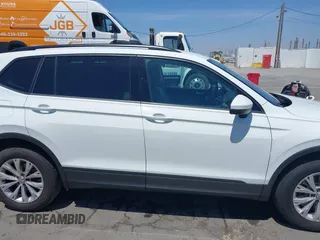 2019 Volkswagen Tiguan S with VIN 3VV1B7AX1KM101407, listed as a IAAI auction lot 42032761 with 51,868 mi miles and . Bid and sale history available at DreamBid. Image 13.