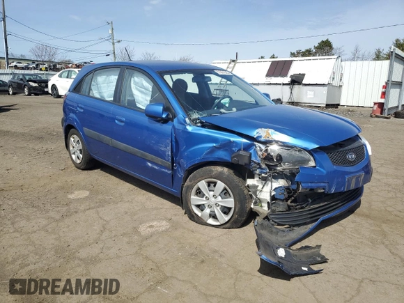 2009 Kia Rio LX with VIN KNADE243296500963, listed as a Copart auction lot 51061595 with 76,596 mi miles and Salvage Title. Bid and sale history available at carsss.com. Image 4.