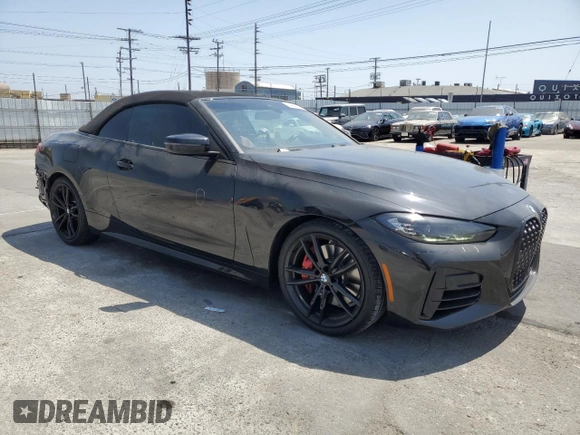 2022 BMW 4 Series M440i with VIN WBA53AT01NCJ52404, listed as a Copart auction lot 54464474 with 16,880 mi miles and Salvage title. Bid and sale history available at DreamBid. Image 4.