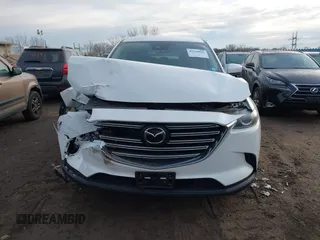2020 Mazda CX-9 Sport with VIN JM3TCBBY6L0414673, listed as a IAAI auction lot 41310952 with 27,686 mi miles. Bid and sale history available at carsss.com. Image 12.