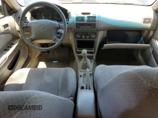 1999 Toyota Corolla VE with VIN 1NXBR12E7XZ240321, listed as a Copart auction lot 64259115 with 144,145 mi miles and Salvage title. Bid and sale history available at DreamBid. Image 8.