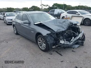 2015 BMW 5 Series 528i with VIN WBA5A5C52FD514549, listed as a IAAI auction lot 41812177 with 107,819 mi miles. Bid and sale history available at carsss.com. Image 1.