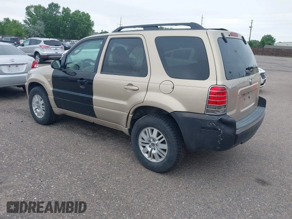 2007 Mercury Mariner Luxury with VIN 4M2YU91187KJ14159, listed as a IAAI auction lot 42576802 with 166,027 mi miles and . Bid and sale history available at DreamBid. Image 3.