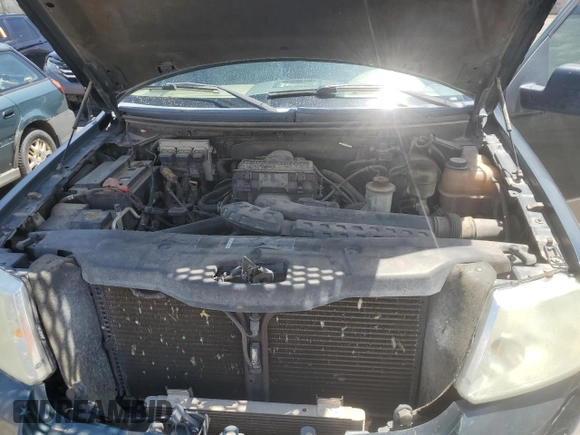 2005 Ford F-150 XLT z VIN 1FTPX14595NB03806, wystawiony jako Copart lot #55855355 z przebiegiem 139 551 mil mil oraz Szkoda całkowita • Salvage title. Historia ofert i sprzedaży dostępna na DreamBid. Obrazek 11.