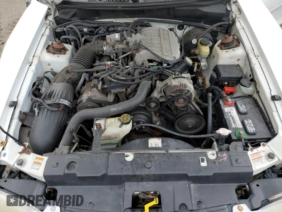 1997 Ford Mustang with VIN 1FALP4046VF180467, listed as a Copart auction lot 60754265 with 154,676 mi miles and Salvage title. Bid and sale history available at DreamBid. Image 11.