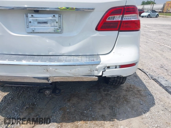 2015 Mercedes-Benz M 350 with VIN 4JGDA5JB0FA452749, listed as a IAAI auction lot 42412440 with 88,304 mi miles and . Bid and sale history available at DreamBid. Image 6.
