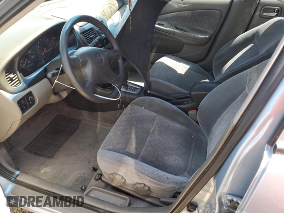 2000 Nissan Sentra XE with VIN 3N1CB51DXYL353188, listed as a Copart auction lot 56490115 with 190,643 mi miles and Salvage title. Bid and sale history available at DreamBid. Image 7.