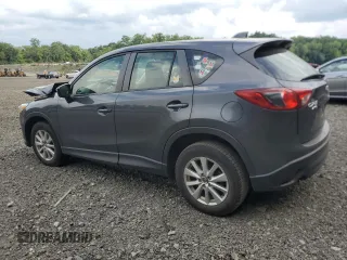 2015 Mazda CX-5 Sport with VIN JM3KE4BYXF0511249, listed as a Copart auction lot 63310695 with 208,615 mi miles and Salvage title. Bid and sale history available at DreamBid. Image 2.