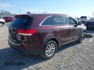 2017 Kia Sorento LX with VIN 5XYPG4A37HG255017, listed as a IAAI auction lot 42090967 with 122,021 mi miles. Bid and sale history available at carsss.com. Image 4.