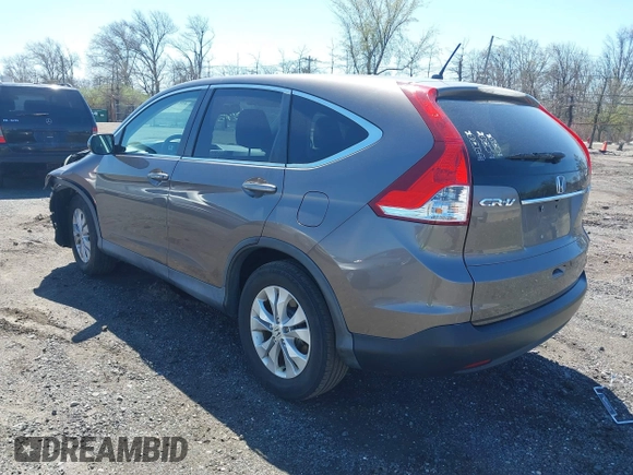 2014 Honda CR-V EX with VIN 2HKRM4H50EH628721, listed as a IAAI auction lot 42064143 with 103,009 mi miles and . Bid and sale history available at carsss.com. Image 3.