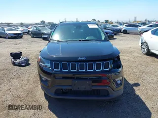 2017 Jeep Compass Latitude with VIN 3C4NJCBB6HT605934, listed as a IAAI auction lot 41846329 with 145,275 mi miles and . Bid and sale history available at DreamBid. Image 13.