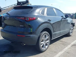 2021 Mazda CX-30 Select with VIN 3MVDMBBL5MM312972, listed as a IAAI auction lot 41792275 with 11,683 mi miles and . Bid and sale history available at carsss.com. Image 4.