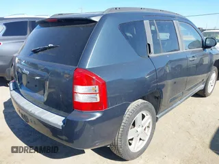 2007 Jeep Compass Sport with VIN 1J8FF47W27D110618, listed as a IAAI auction lot 42195311 with 135,128 mi miles and . Bid and sale history available at carsss.com. Image 4.
