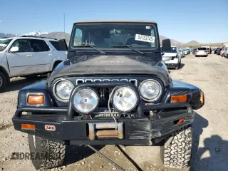 1999 Jeep Wrangler Sahara with VIN 1J4FY49S9XP479545, listed as a Copart auction lot 54753745 with 34,642 mi miles and Salvage title. Bid and sale history available at DreamBid. Image 5.
