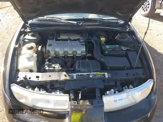 1997 Saturn SC z VIN 1G8ZE1283VZ163658, wystawiony jako IAAI lot #40494467 z przebiegiem 111 701 mil mil oraz . Historia ofert i sprzedaży dostępna na DreamBid. Obrazek 10.