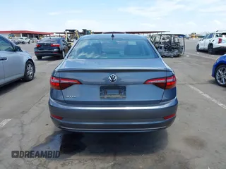 2019 Volkswagen Jetta S z VIN 3VWC57BU0KM223143, wystawiony jako IAAI lot #42605872 z przebiegiem 144 245 mil mil oraz . Historia ofert i sprzedaży dostępna na DreamBid. Obrazek 17.