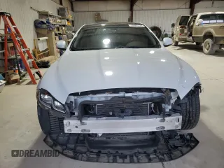 2016 Jaguar XJ R-Sport with VIN SAJWJ1CDXG8W00145, listed as a Copart auction lot 49901234 with 76,629 mi miles and . Bid and sale history available at DreamBid. Image 5.