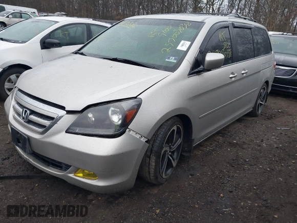 2005 Honda Odyssey EX-L with VIN 5FNRL38645B417008, listed as a IAAI auction lot 41870386 with Not Provided miles and . Bid and sale history available at carsss.com. Image 2.