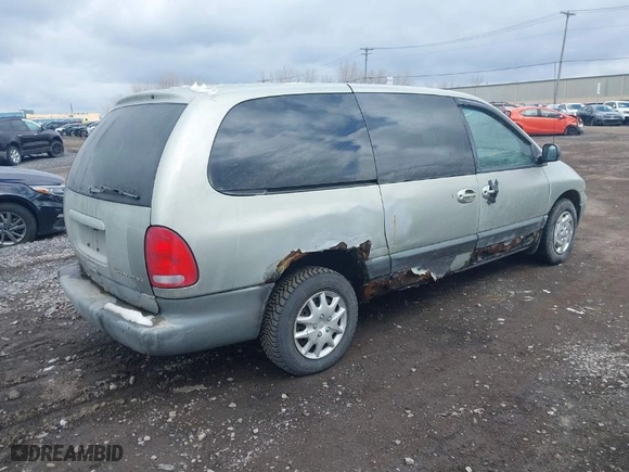1999 Dodge Caravan SE with VIN 1B4GP44R4XB854348, listed as a IAAI auction lot 41871640 with 169,312 mi miles. Bid and sale history available at carsss.com. Image 4.