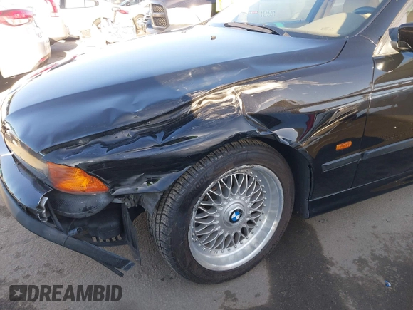 2000 BMW 5 Series 528iA with VIN WBADM6343YGU12629, listed as a IAAI auction lot 41963814 with 206,922 mi miles. Bid and sale history available at carsss.com. Image 6.