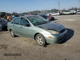 2004 Ford Focus SE with VIN 1FAFP34314W127053, listed as a Copart auction lot 48652265 with 241,841 mi miles and Salvage title. Bid and sale history available at DreamBid. Image 10.