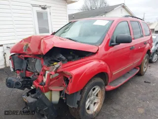 2004 Dodge Durango Limited with VIN 1D4HB58D94F111363, listed as a IAAI auction lot 41440895 with 128,897 mi miles. Bid and sale history available at carsss.com. Image 2.