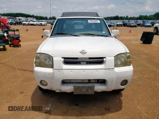2001 Nissan Frontier SE z VIN 1N6ED27T21C305986, wystawiony jako Copart lot #59665065 z przebiegiem 201 540 mil mil oraz Czysty tytuł • Clean title. Historia ofert i sprzedaży dostępna na DreamBid. Obrazek 5.