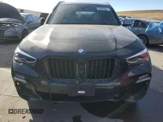 2021 BMW X5 M50i with VIN 5UXJU4C01M9F13949, listed as a Copart auction lot 84485564 with 0 mi miles and Salvage Title. Bid and sale history available at carsss.com. Image 5.