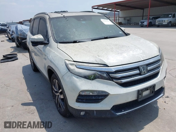 2017 Honda Pilot Touring z VIN 5FNYF6H93HB007898, wystawiony jako IAAI lot #42289193 z przebiegiem 70 498 mil mil oraz . Historia ofert i sprzedaży dostępna na DreamBid. Obrazek 1.