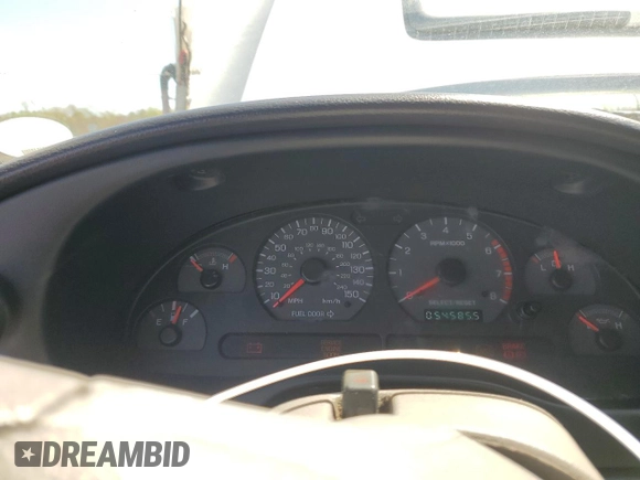 1999 Ford Mustang with VIN 1FAFP4448XF233101, listed as a Copart auction lot 54701005 with 54,585 mi miles and Salvage title. Bid and sale history available at DreamBid. Image 9.