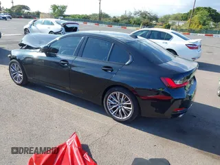 2023 BMW 3 Series 330i with VIN 3MW69FF06P8D71252, listed as a IAAI auction lot 41916329 with 302 mi miles. Bid and sale history available at carsss.com. Image 3.