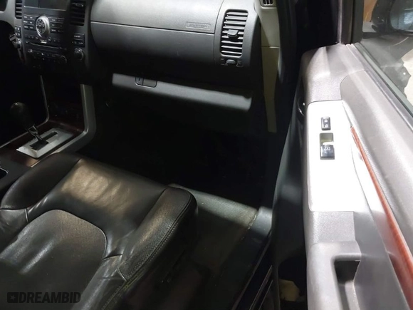 2012 Nissan Pathfinder SV with VIN 5N1AR1NB8CC633788, listed as a IAAI auction lot 41476990 with 167,444 mi miles. Bid and sale history available at carsss.com. Image 5.