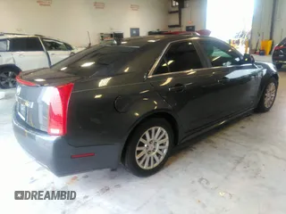 2013 Cadillac CTS Luxury with VIN 1G6DE5E54D0156491, listed as a IAAI auction lot 39844556 with 104,089 mi miles and . Bid and sale history available at DreamBid. Image 4.