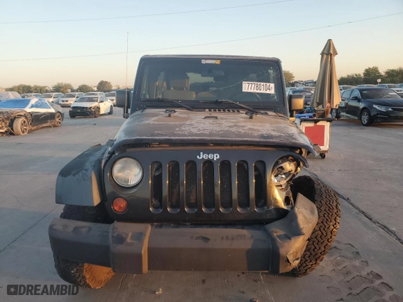 2009 Jeep Wrangler Unlimited X with VIN 1J4GA39129L729177, listed as a Copart auction lot 77780104 with 85,282 mi miles and Salvage Title. Bid and sale history available at carsss.com. Image 5.