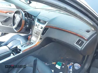 2010 Cadillac CTS Performance with VIN 1G6DL5EV4A0109706, listed as a IAAI auction lot 41355556 with 239,748 mi miles. Bid and sale history available at carsss.com. Image 5.