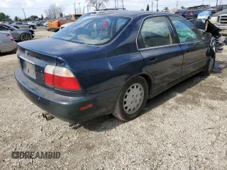 1997 Honda Accord EX with VIN 1HGCD5668VA262569, listed as a Copart auction lot 44713835 with 261,346 mi miles and Salvage Title. Bid and sale history available at DreamBid. Image 3.