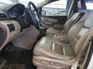 2011 Honda Odyssey Touring Elite with VIN 5FNRL5H90BB083092, listed as a Copart auction lot 54178785 with 135,765 mi miles and Salvage Title. Bid and sale history available at DreamBid. Image 7.